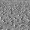 Le vent sur la neige gelée crée ces crêtes de glace à l’infini de la steppe